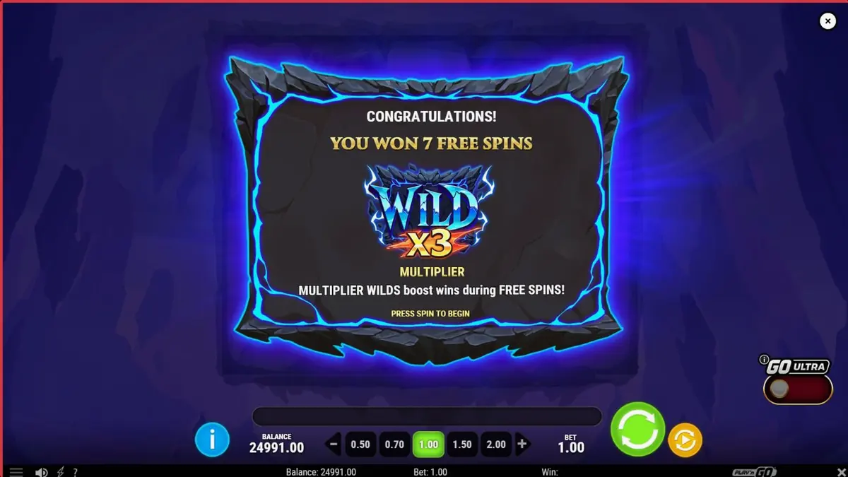 Tampilan antarmuka seluler slot Triple Beasts of Fortune dengan latar belakang ngarai.